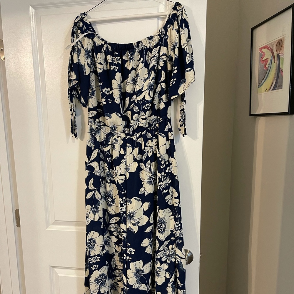 Stunning Navy Jumpsuit with white flowers accent
